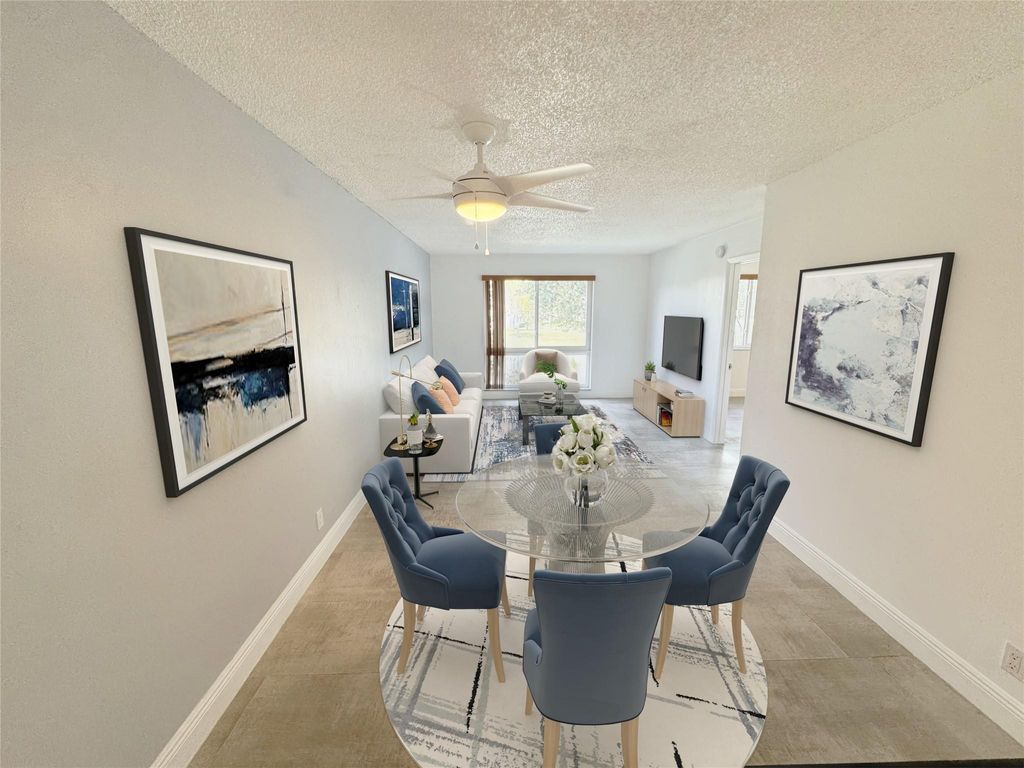 Photo of 2106 S Cypress Bend Drive #209, Pompano Beach, FL 33069 (MLS # F10431994)