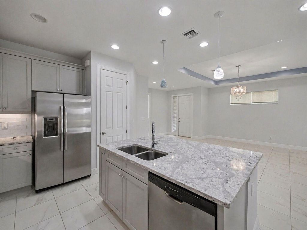 Photo of 24072 SW Firenze Way, Port Saint Lucie, FL 34986 (MLS # B26020388)