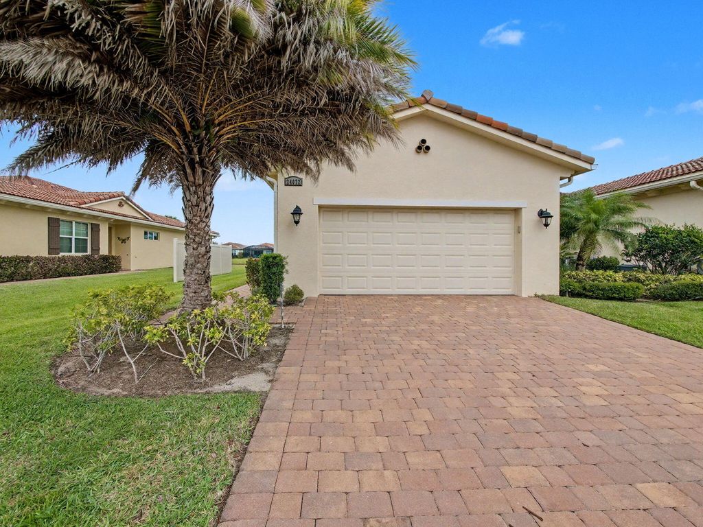 Photo of 24072 SW Firenze Way, Port Saint Lucie, FL 34986 (MLS # B26020388)