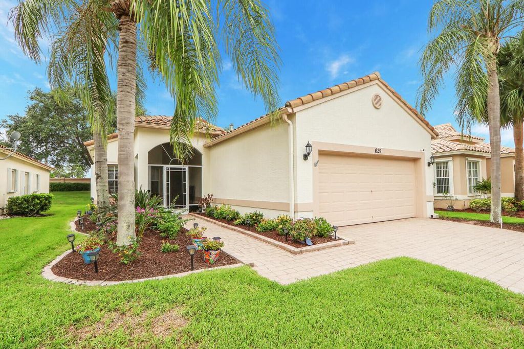 Photo of 629 NW Whitfield Way, Port Saint Lucie, FL 34986 (MLS # R10996171)