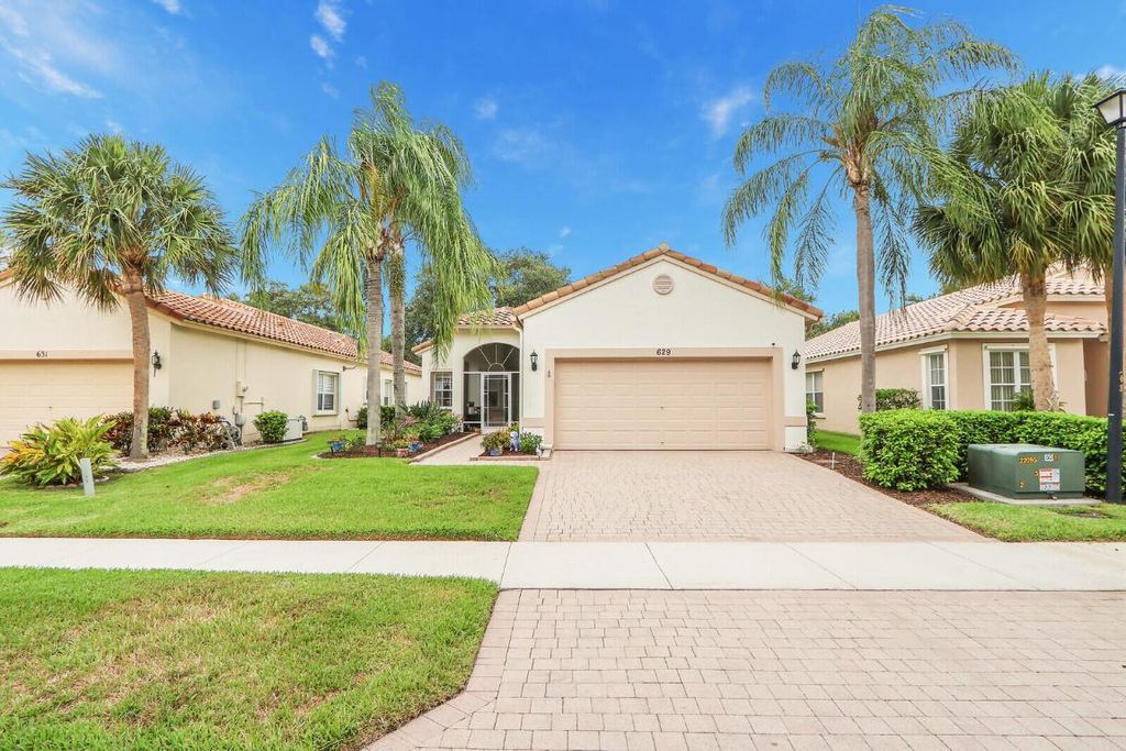 Photo of 629 NW Whitfield Way, Port Saint Lucie, FL 34986 (MLS # R10996171)