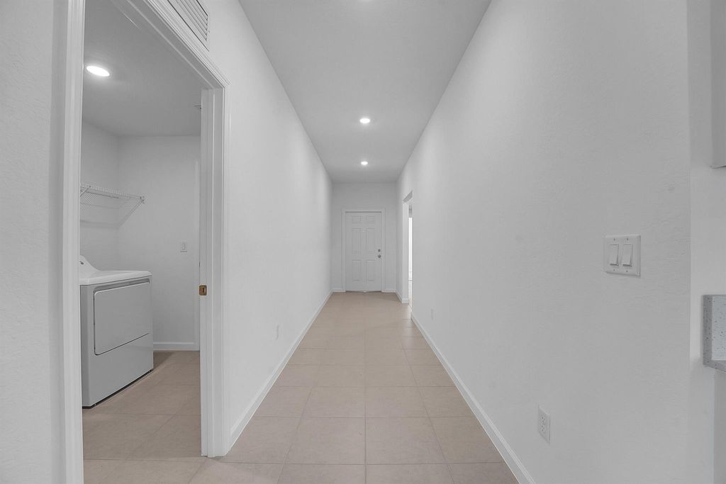 Photo of 5936 NW Mangrove Drive, Port Saint Lucie, FL 34987 (MLS # R11077895)