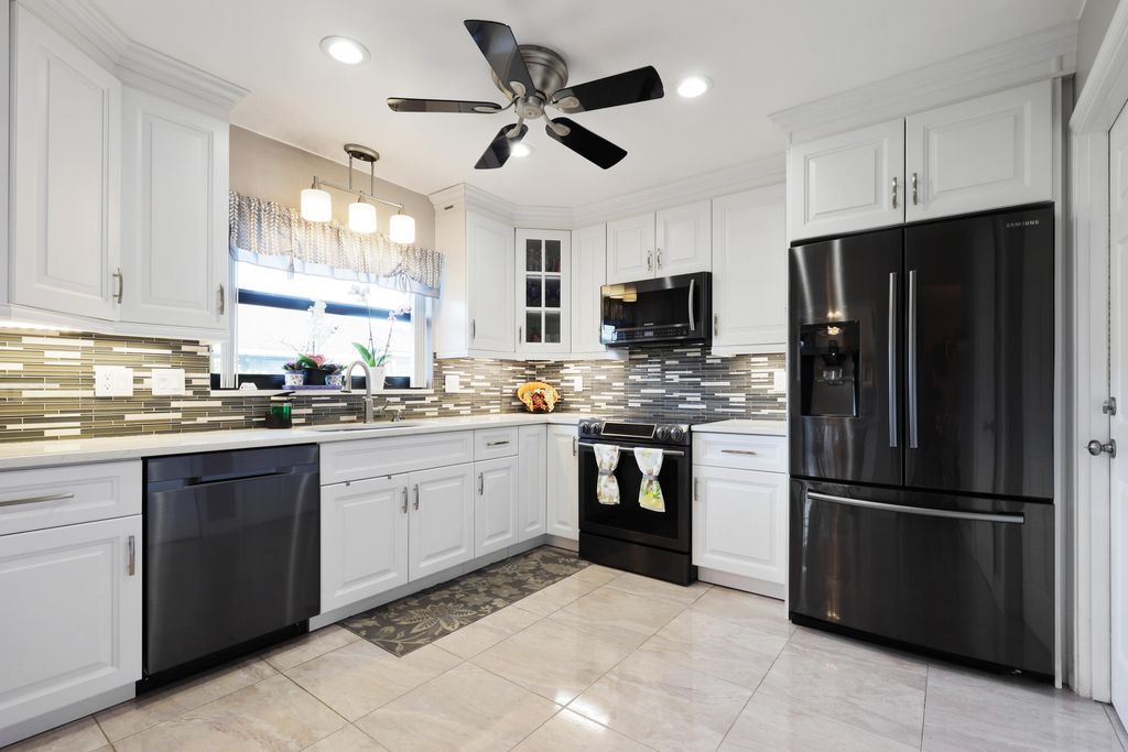 Photo of 9860 Chestnut Tree Terrace #A, Boynton Beach, FL 33436 (MLS # B26005779)