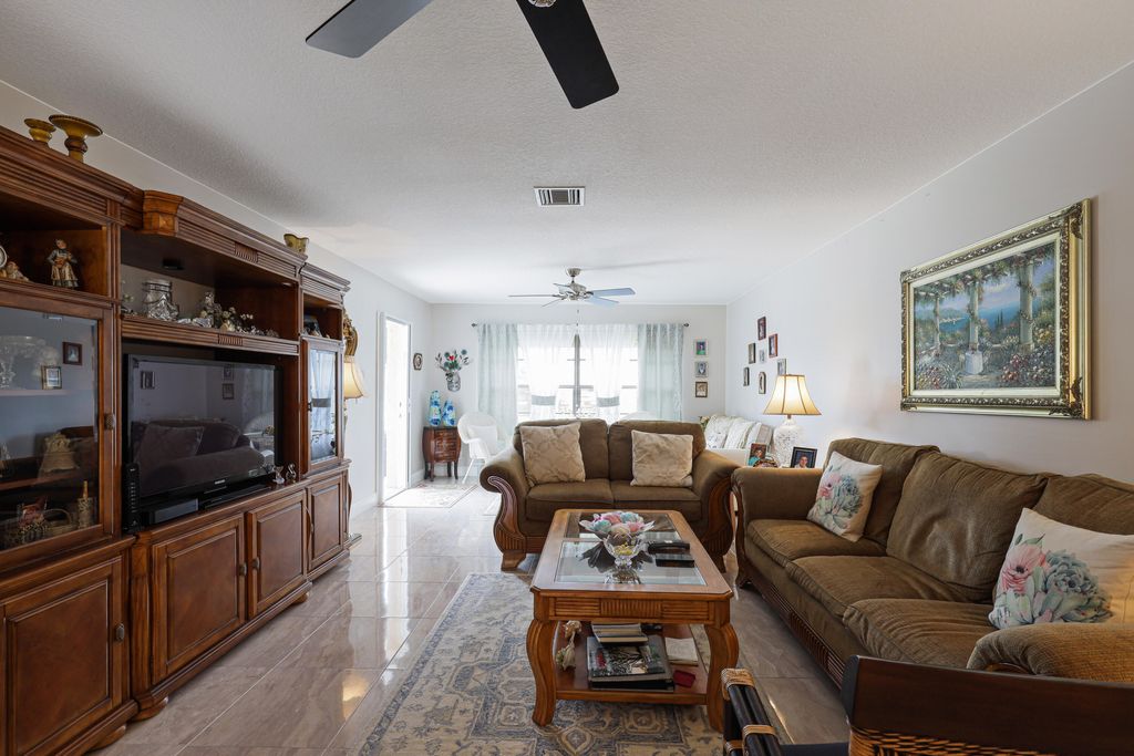Photo of 9860 Chestnut Tree Terrace #A, Boynton Beach, FL 33436 (MLS # B26005779)