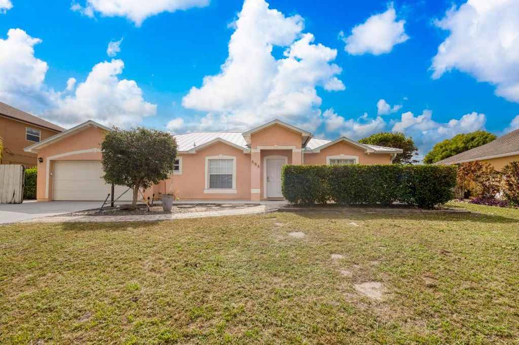 Photo of 586 SW Kaabe Avenue, Port Saint Lucie, FL 34953 (MLS # R11138758)