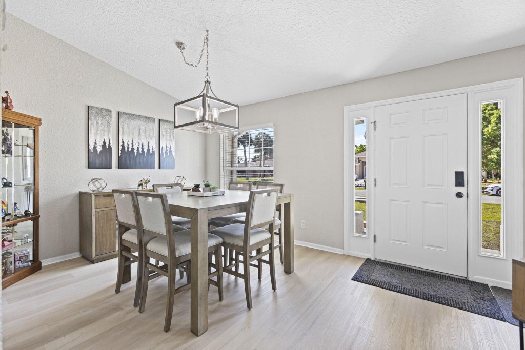 Photo of 861 SE Cavern Avenue, Port Saint Lucie, FL 34983 (MLS # B26006757)