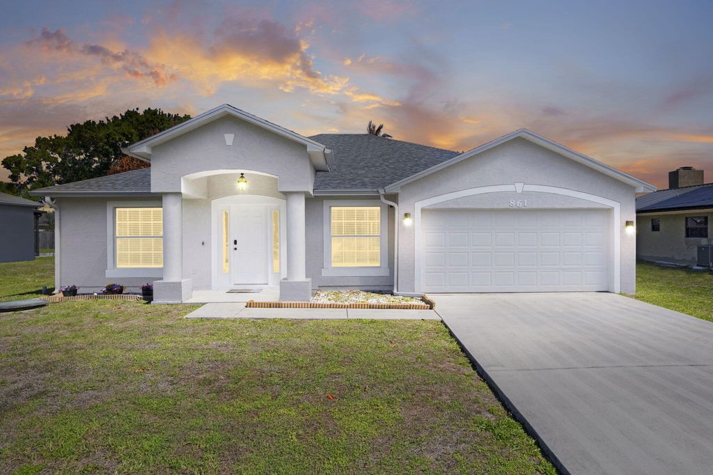 Photo of 861 SE Cavern Avenue, Port Saint Lucie, FL 34983 (MLS # B26006757)