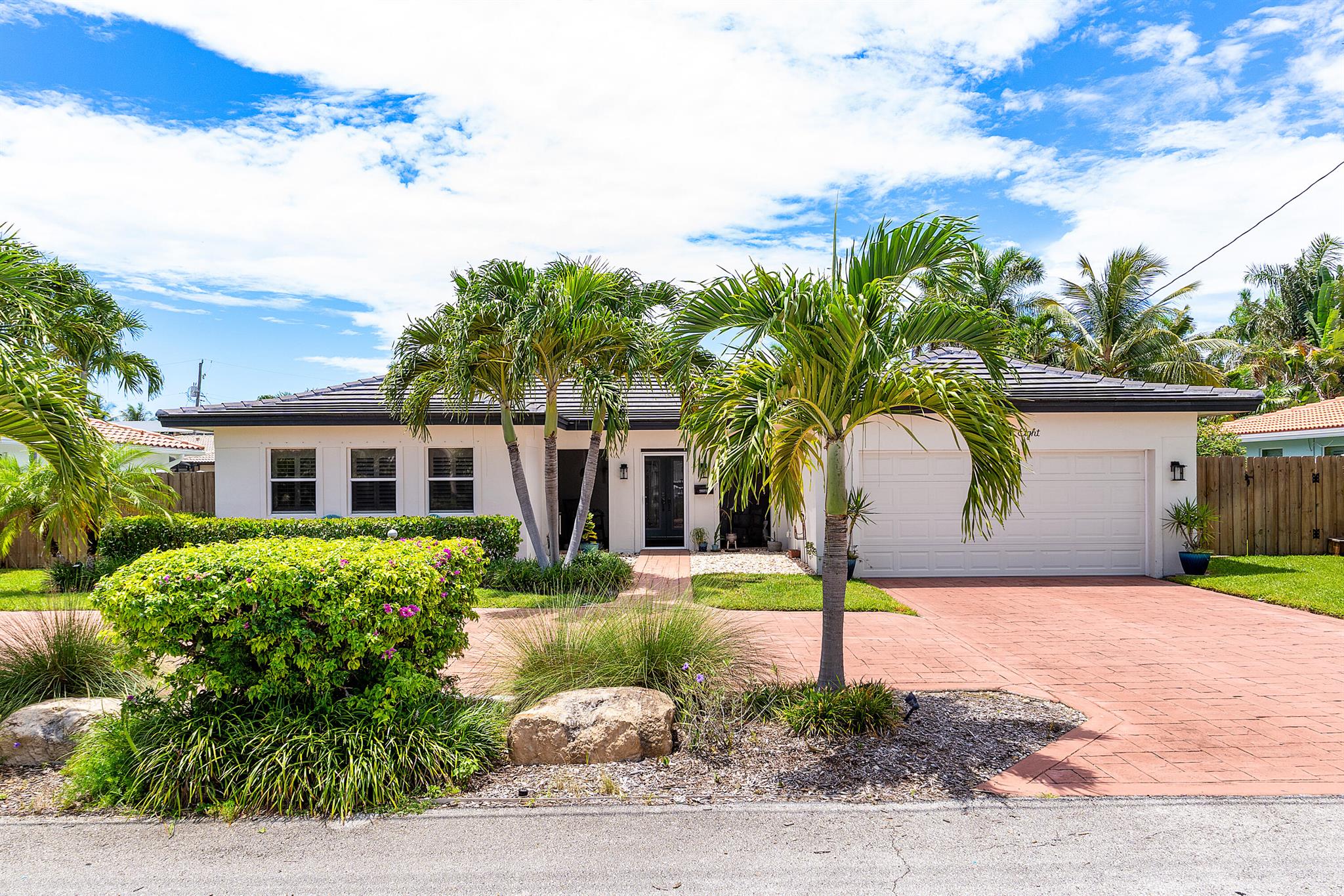 Charming and fully updated 2-bedroom, 2-bath single-family home in Bel Marra, East Boca Raton. Ideally located east of US1, just minutes to beaches, shopping, and dining. This property has been beautifully renovated with marble flooring throughout, a stunning kitchen featuring quartzite countertops, white shaker cabinets, marble backsplash, and new appliances including a gas range. Roof (2022), A/C (2023) and whole house generator.Enjoy outdoor living in the spacious, fully fenced backyard, private pool, landscaping, and room to park a boat or RV. No HOA.Whether you're looking for a full-time residence or a vacation retreat, this move-in ready home blends timeless charm with modern updates in one of East Boca's most desirable neighborhoods. 24 hour notice for a private showing