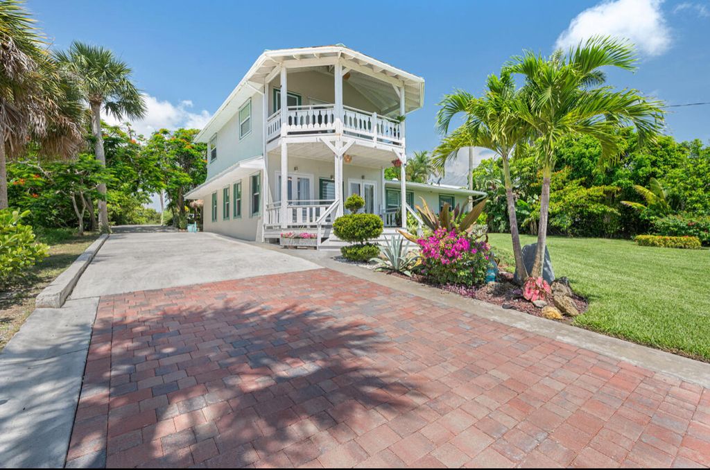 Photo of 12417 S Indian River Drive, Jensen Beach, FL 34957 (MLS # B26014757)