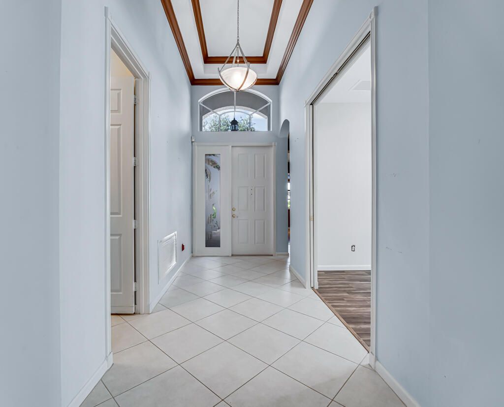 Photo of 7932 Seagrape Shores Drive, Lake Worth, FL 33467 (MLS # R11128964)