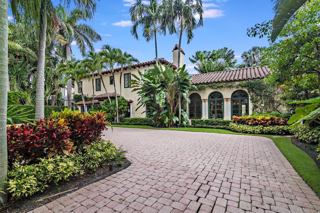 Beautiful Mediterranean Estate with Classic Old World Charm on prestigious Dunbar Road offers lovely manicured tropical grounds, oversized lot, large pool with fountain surrounded by covered loggias - including outside dining and lounge area and a unique wet bar clad in antique Portuguese tiles. The whole compound features wonderful original details as well as modernization for today's lifestyle. The 5,730 sqft main house offers a sweeping sun-filled Great room with original wood beams,16' ceilings and an impressive wood burning fireplace. Formal living room and Dining room has beautiful Pecky Cypress beamed ceilings and Antique fireplace. Library/Den with wet bar and a sizable eat-in-kitchen and breakfast nook features a pantry and adjacent full separate laundry room.