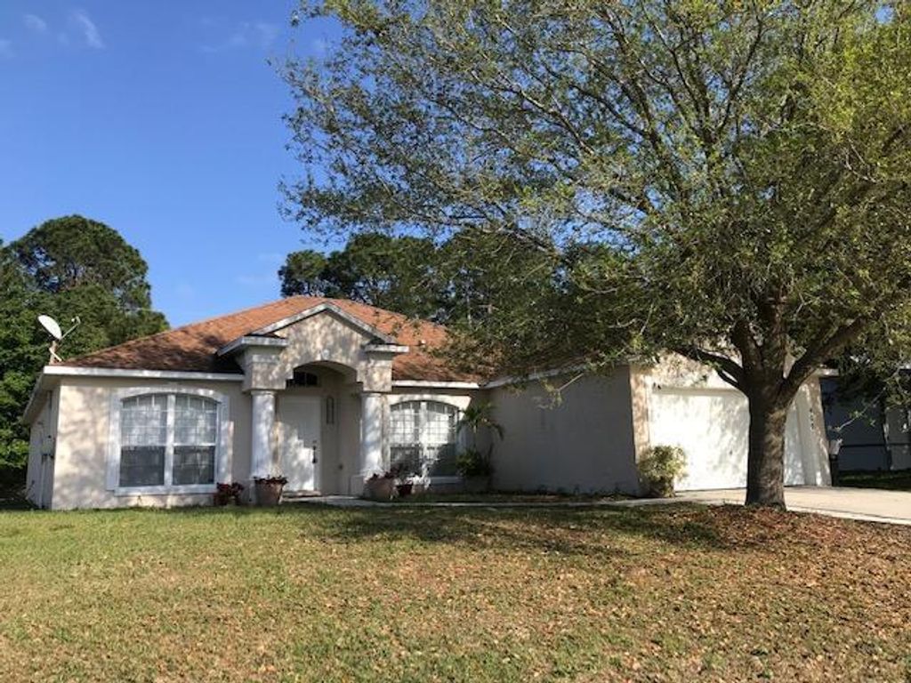 Photo of 400 SW Ryder Road, Port St Lucie, FL 34953 (MLS # R10893493)