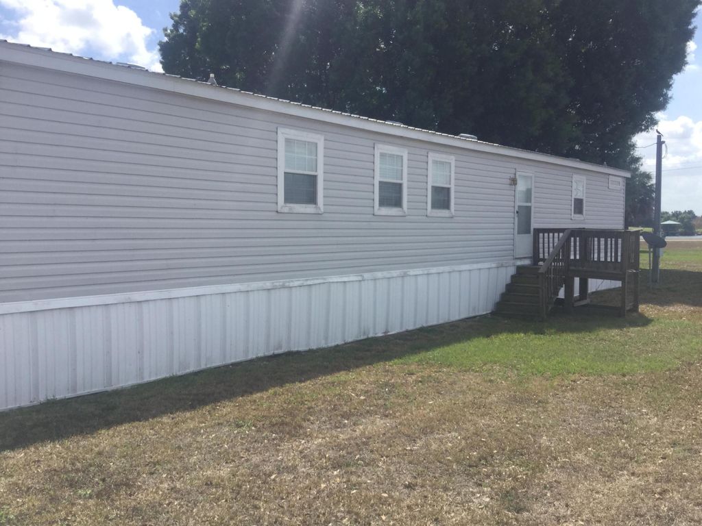 Photo of 1753 West Avenue, Moore Haven, FL 33471 (MLS # B26004833)