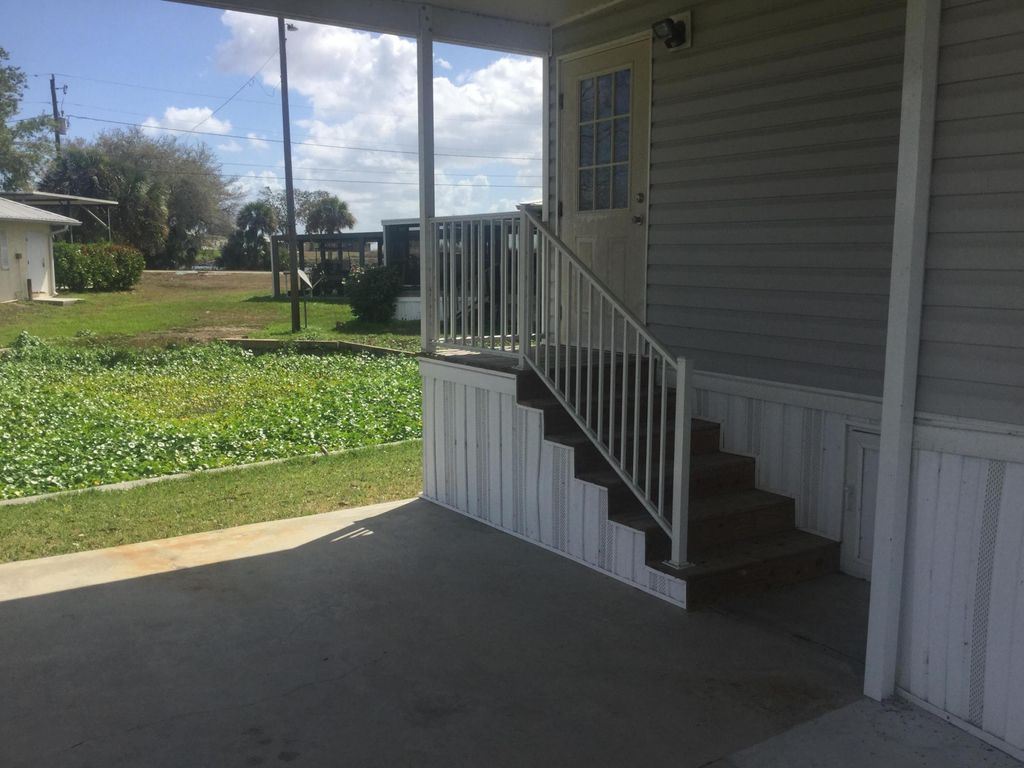 Photo of 1753 West Avenue, Moore Haven, FL 33471 (MLS # B26004833)