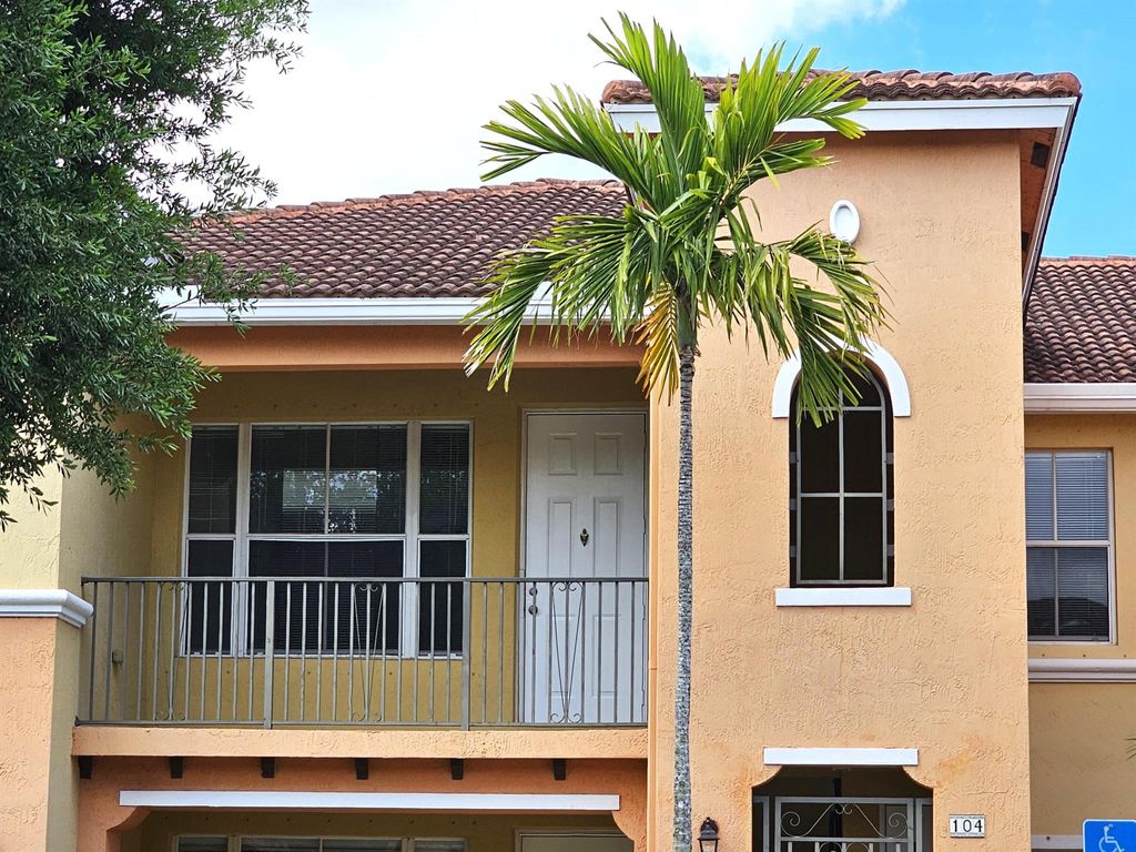 Photo of 3569 Forest Hill Boulevard #104, Palm Springs, FL 33406 (MLS # R10976654)