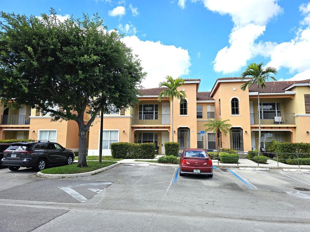 Photo of 3569 Forest Hill Boulevard #104, Palm Springs, FL 33406 (MLS # R10976654)