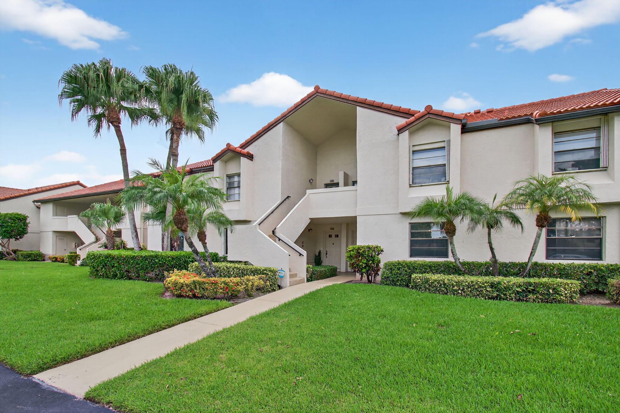 Rarely available 1st floor corner unit with serene lake views. This immaculately maintained corner unit feature 2 Bedroom and Den which can be converted into a 3rd Bedroom. This is the largest floor plan available in The Coves. A must-see updated kitchen with custom cabinetry, granite countertops, stainless appliances, and beautifully remodeled bathrooms. HERE ARE NO MEMBERSHIP FEES IN ABERDEEN EAST. The clubhouse amenities are all included in your HOA. Aberdeen East is a beautifully landscaped community that features an active adult lifestyle in a great location convenient to shopping, restaurants, golf courses and beaches. Enjoy this resort style living with an active clubhouse, live entertainment in the ballroom, resort pool area, 3 satellite pools, gym, card rooms, tennis courts,