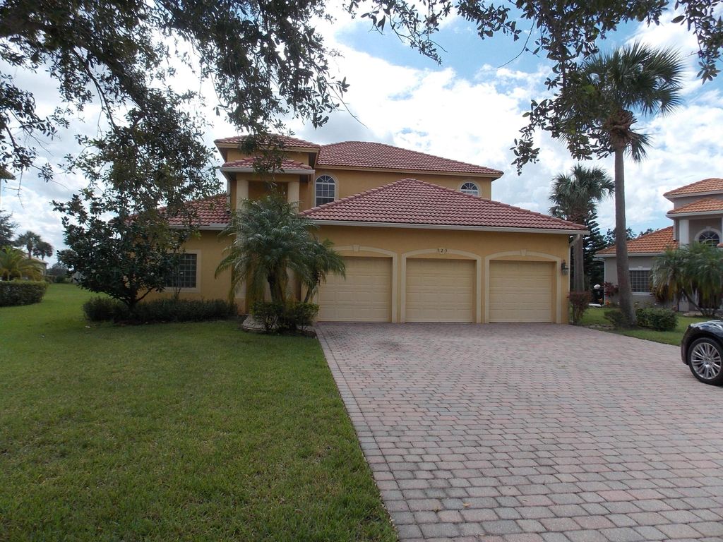 Photo of 323 NW Sheffield Circle, Port Saint Lucie, FL 34983 (MLS # R11121435)