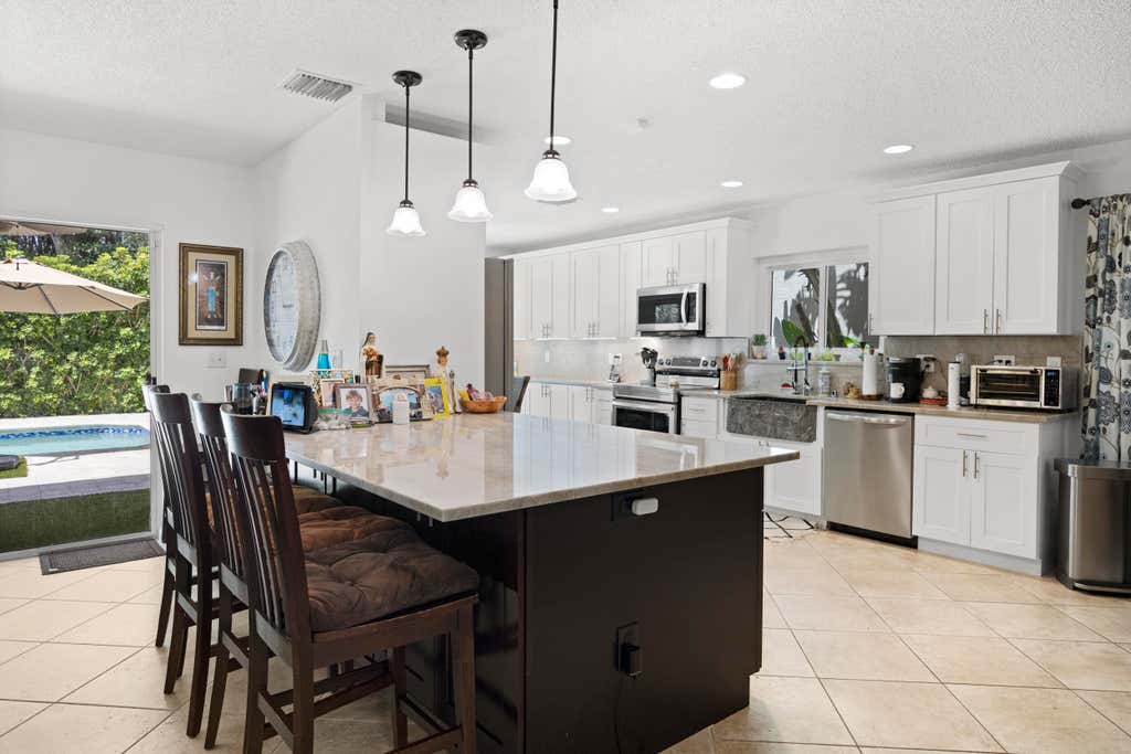 Photo of 10454 Buena Ventura Drive, Boca Raton, FL 33498 (MLS # R11113100)