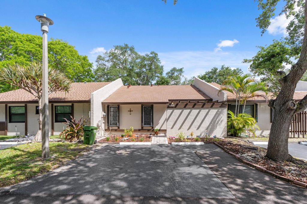 Photo of 9709 NW 16th Street, Pembroke Pines, FL 33024 (MLS # B26022160)