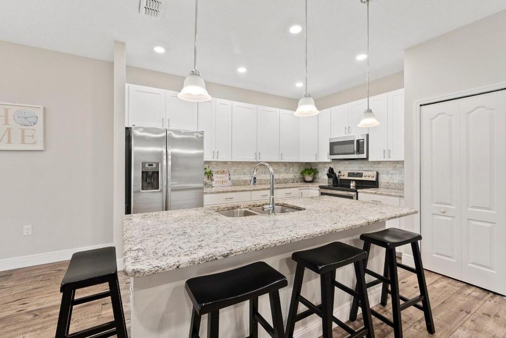 Photo of 5265 NW Aljo Circle, Port Saint Lucie, FL 34986 (MLS # R10929380)