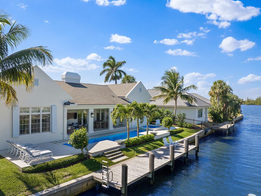 Bring your boat! This 2020 built waterfront residence, w/ 4BD/3+BA has quick access to the intracoastal. Features include Lutron Lighting inside and out, custom window treatments, coffered ceiling, wainscoting throughout, marble & wood floors, and so much more. The state-of-the-art island kitchen with top-tier appliances, gas cooktop and wet bar is any chef's dream. The home's outdoor living area boasts a gas-heated salt-water pool and spa, firepits, and dock. Oversized 2 car garage + golf cart garage. Walk, ride your bike or take your golf cart to all of Vero's shops, restaurants and beaches.