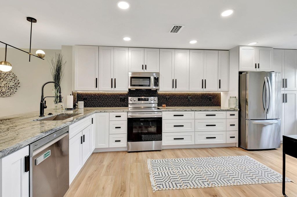 Photo of 3 Stratford Drive #C, Boynton Beach, FL 33436 (MLS # R10965854)