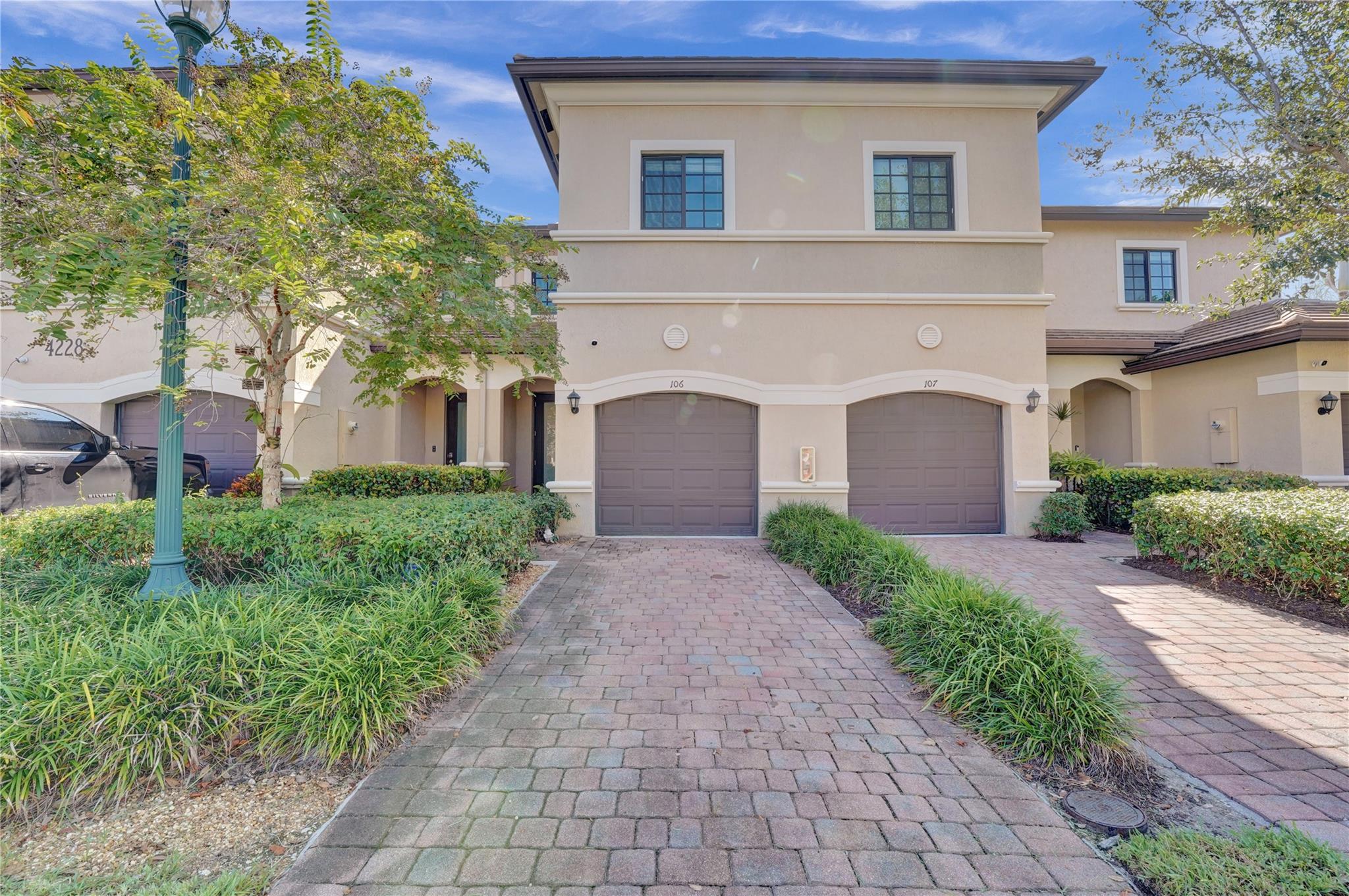 Discover this newer build, light-filled home with elegant finishes. Step inside to a bright space enhanced by upgraded features throughout. The kitchen boasts a sleek upgraded fridge, microwave, & faucet, along with pull-out storage in the pantry. Upstairs, luxurious countertops & stylish vessel sinks elevate the bathrooms, complete with frameless glass shower doors & rain shower heads. All closets feature custom built-ins. The laundry room offers additional storage. The additional extended patio is perfect for outdoor living. The garage includes extra storage shelves. Stay connected with smart home technology, including two mounted smart TVs, ADT security cameras & Ring doorbell. This townhome has everything you need for modern living in an inviting space! Close to Wilton & Downtown OP!
