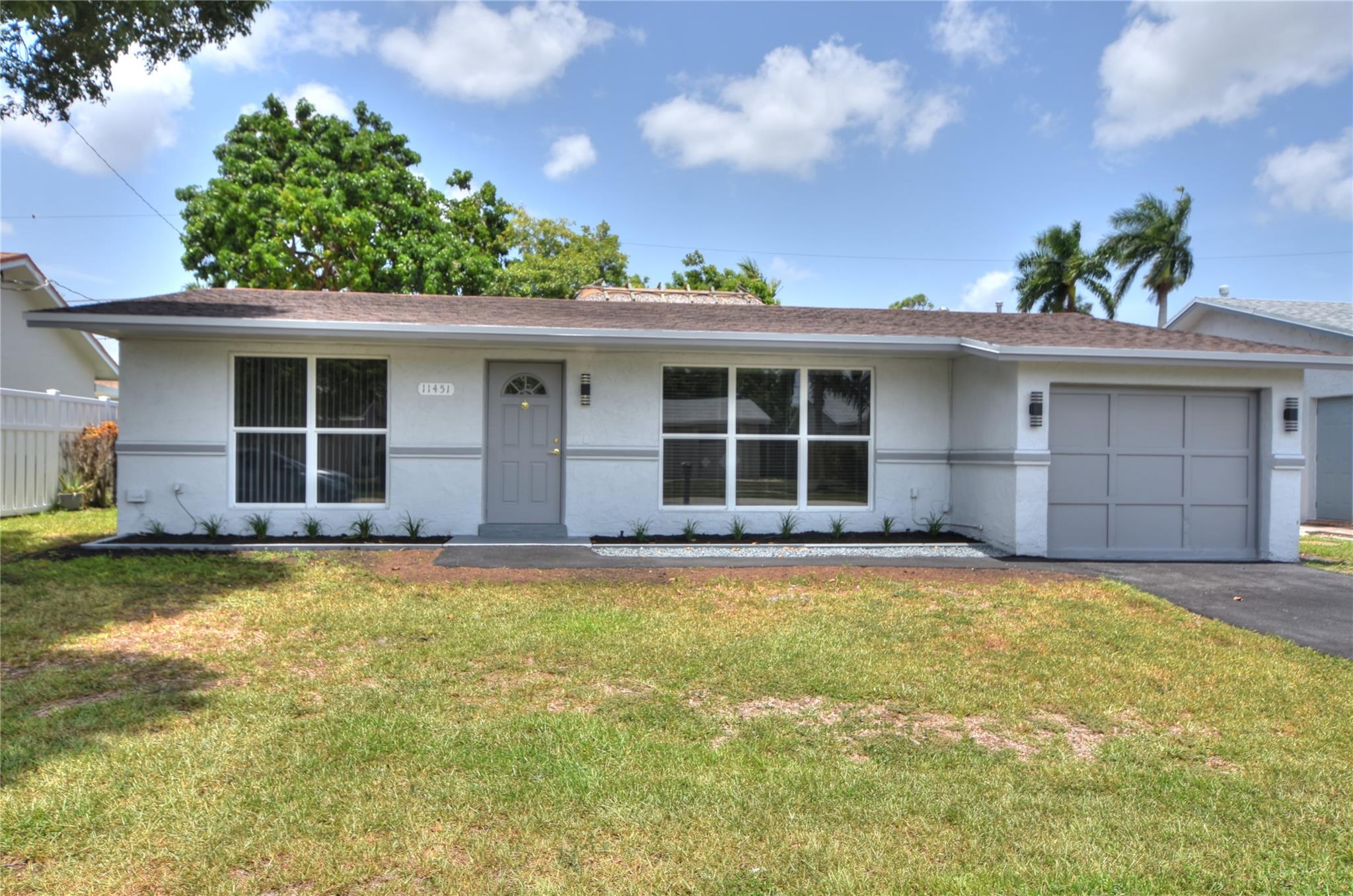 Move-in ready 3BR/2BA single-family home with no HOA! Freshly painted inside and out with a resurfaced asphalt driveway and walkway. New landscaping with automatic sprinkler system. Inside, enjoy luxury vinyl plank flooring in all bedrooms and tile throughout the rest—no carpet! The kitchen features brand-new stainless steel appliances, including stove, dishwasher, and microwave. Relax or entertain in the spacious backyard with tiki hut and large patio area. This updated home offers comfort, style, and low-maintenance living—don’t miss out!