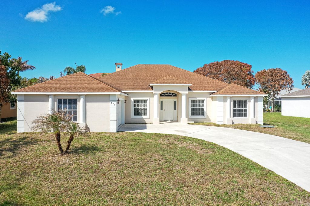 Photo of 491 SW Mccomb Avenue, Port Saint Lucie, FL 34953 (MLS # B26002315)
