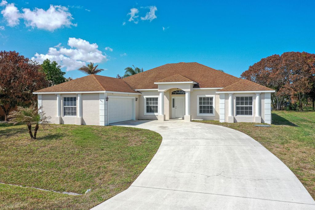 Photo of 491 SW Mccomb Avenue, Port Saint Lucie, FL 34953 (MLS # B26002315)