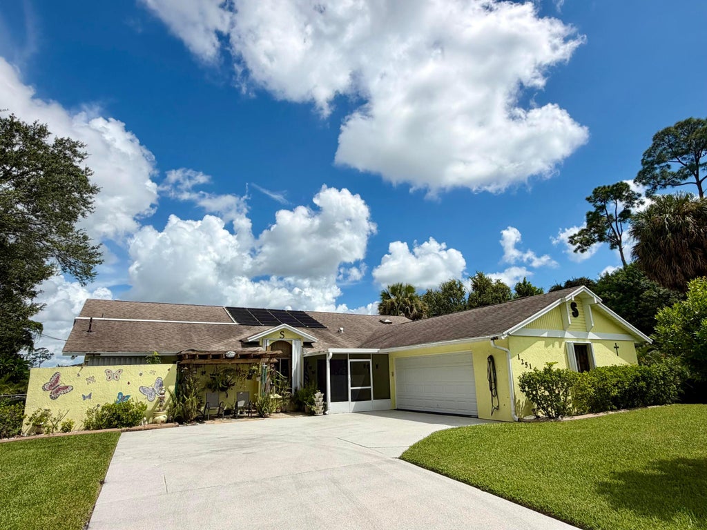 Photo of 1251 SW Abingdon Avenue, Port Saint Lucie, FL 34953 (MLS # B26077118)
