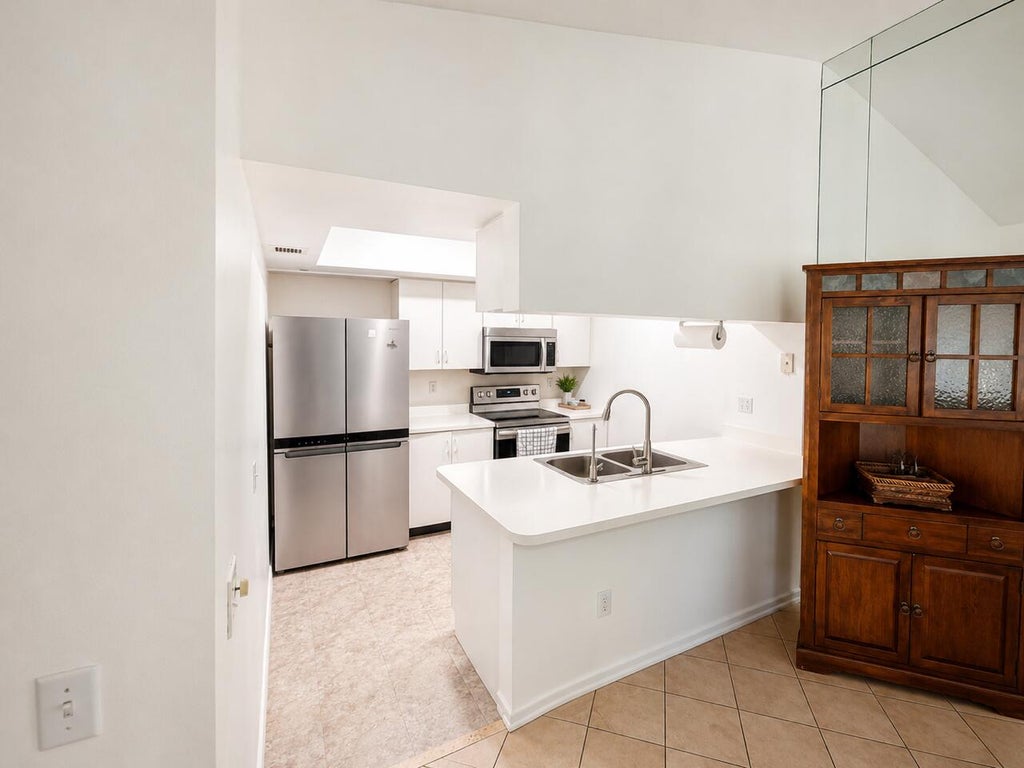 Photo of 125 WATERSIDE Drive #125, Hypoluxo, FL 33462 (MLS # B26057272)