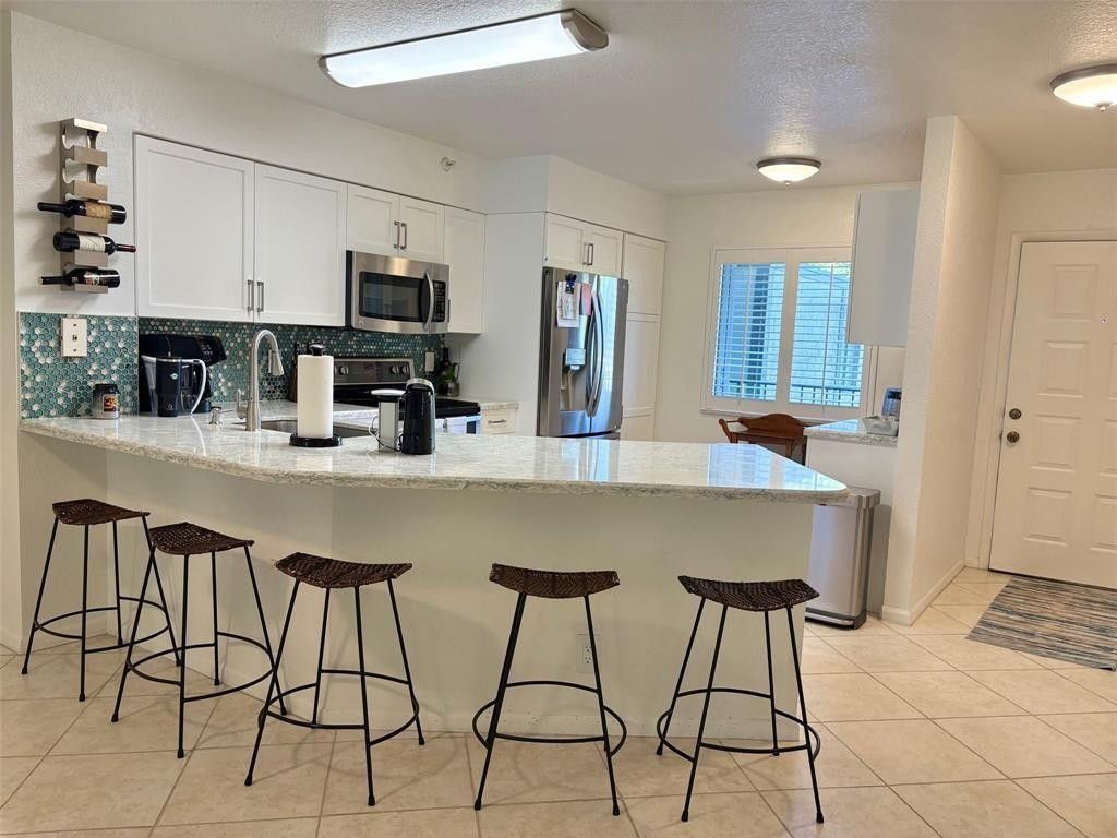 Photo of 2112 S Cypress Bend Drive #203, Pompano Beach, FL 33069 (MLS # F10518824)
