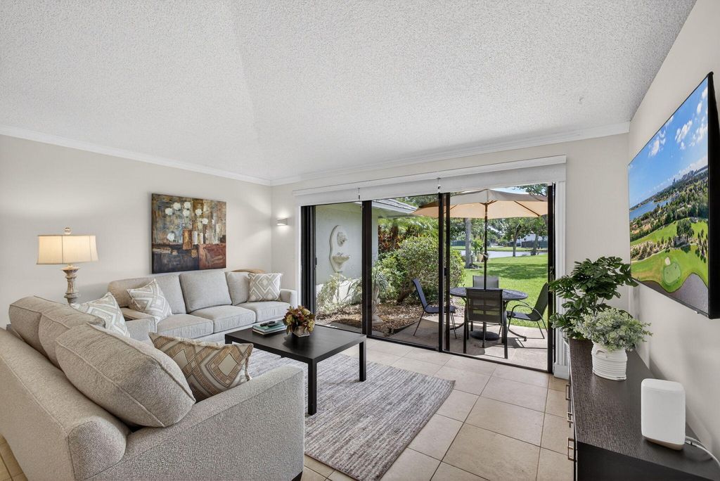 Photo of 119 Club Drive, Palm Beach Gardens, FL 33418 (MLS # B26011148)