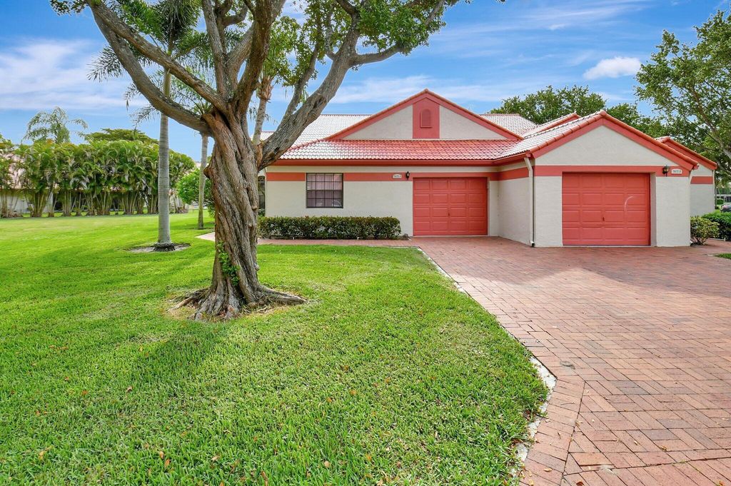 Photo of 7680 Lexington Club Boulevard #A, Delray Beach, FL 33446 (MLS # R11146390)