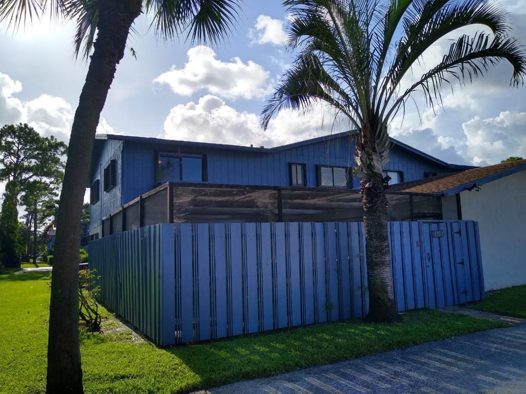 Equal Housing Opportunity. Incredible 3 bedroom, 2 bath townhouse with it's own private poo1! Pool is inside large screened and fenced courtyard. One bedroom and one full bath downstairs with sliding doors to the pool. 2 bedrooms and a full bath upstairs. Stainless steel appliances, granite counters, carpet upstairs and tile downstairs. Accordian hurricane shutters and large utility room with full size washer and dryer. No minimum credit score required, but landlord will review overall credit and may decline based on information on report. 2 parking spaces only. Up to 2 pets considered up to 25 pounds each, no aggressive breeds. No utilities included. No trucks. Rent is $2595 a month that includes pool care, but if tenant wants to take over pool care, rent would be $2495 a month.