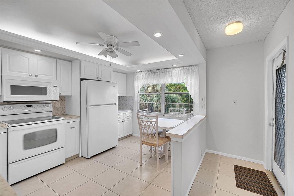 Photo of 2302 Lucaya Lane #O3, Coconut Creek, FL 33066 (MLS # F10536437)