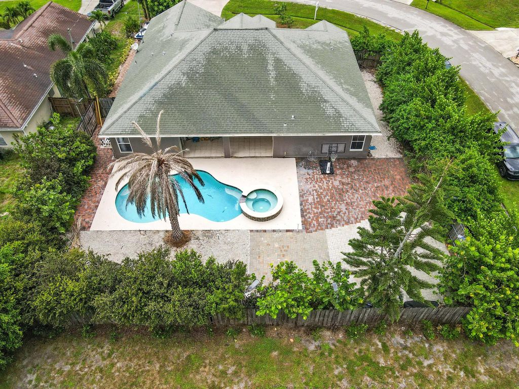 Photo of 602 SW Mccall Road, Port Saint Lucie, FL 34953 (MLS # R11005800)