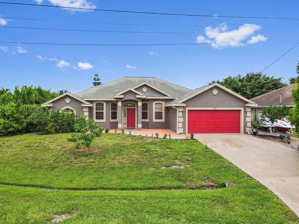 Photo of 602 SW Mccall Road, Port Saint Lucie, FL 34953 (MLS # R11005800)