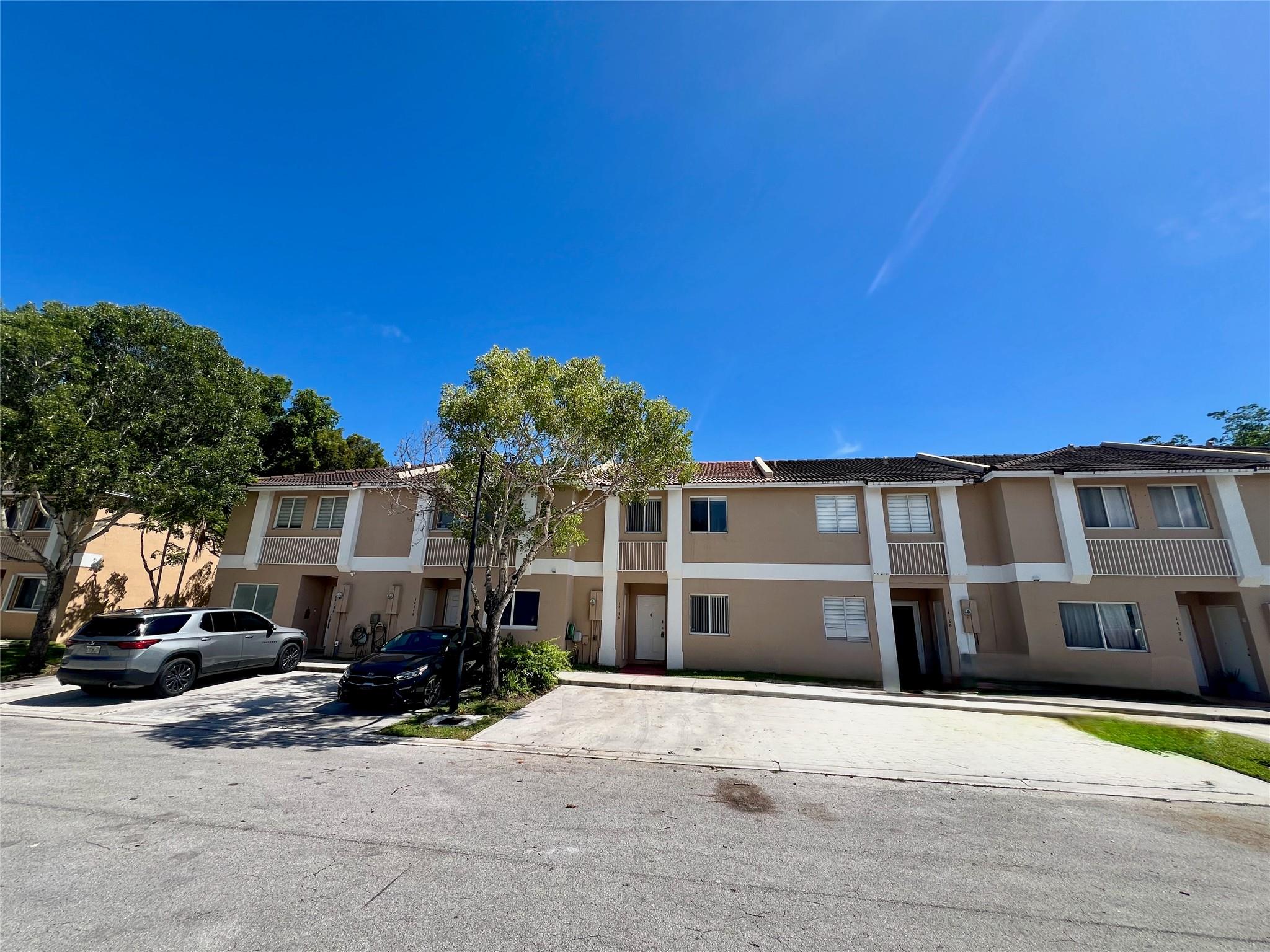 This stunning 3/2.5 townhouse is a gem in a fantastic South Kendall community. The home features a fresh coat of paint and a bright, modern feel. The first level has all tile floors, while the stairs and second level are accented with laminated wood.
Recessed "high hat" lighting brightens the spacious, well-designed layout. Enjoy your own private, grassy patio and the convenience of a practical storage room. The unit also includes two dedicated parking spots located right in front. (Applicants must have 700 or over credit score).
