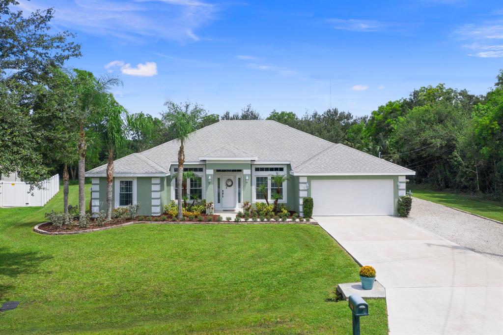 Photo of 5250 NW East Piper Circle Cir, Port St Lucie, FL 34986 (MLS # R10751598)