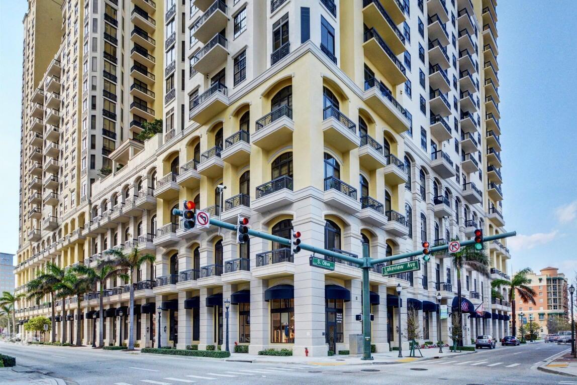 Welcome to Two City Plaza -- Your Luxurious Haven in the Heart of West Palm Beach Experience sophisticated urban living in this exquisite one-bedroom, 1.5-bath residence, perfectly situated within a prestigious 21-story high-rise. With soaring 14-foot ceilings, sleek finishes, and a serene ambiance, this home blends timeless elegance with modern comfort. Step into the grand foyer, where marble floors and contemporary design accents set the stage for refined living. The open-concept living area is bathed in natural light through dramatic floor-to-ceiling windows, creating an inviting, airy atmosphere. Elegant window treatments and motorized shades enhance both comfort and style--ideal for unwinding after a day of exploration or entertaining in effortless luxury.