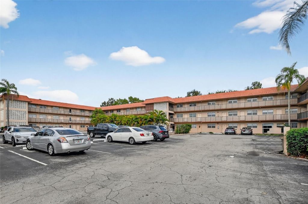 Photo of 3930 Crystal Lake Drive #308, Deerfield Beach, FL 33064 (MLS # F10546248)