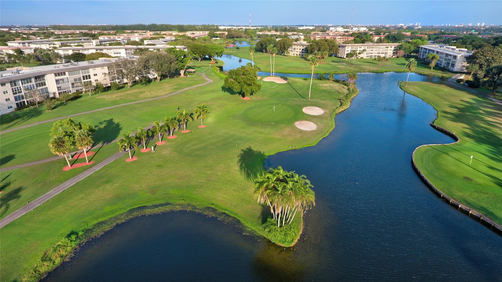Desirable CORNER-CORNER-CORNER ground floor with washer/dryer inside the unit. Newer kitchen cabinets with nice counter tops. Laminate floors through-out. Beautiful lake/fountain view from patio. Walk-in distance to the Granada Pool. Park right outside the Apt. This condo was priced for a quick sale!. A must see!. ASSOC REQUIRES 20% DOWN & 1 OCCUP 55+