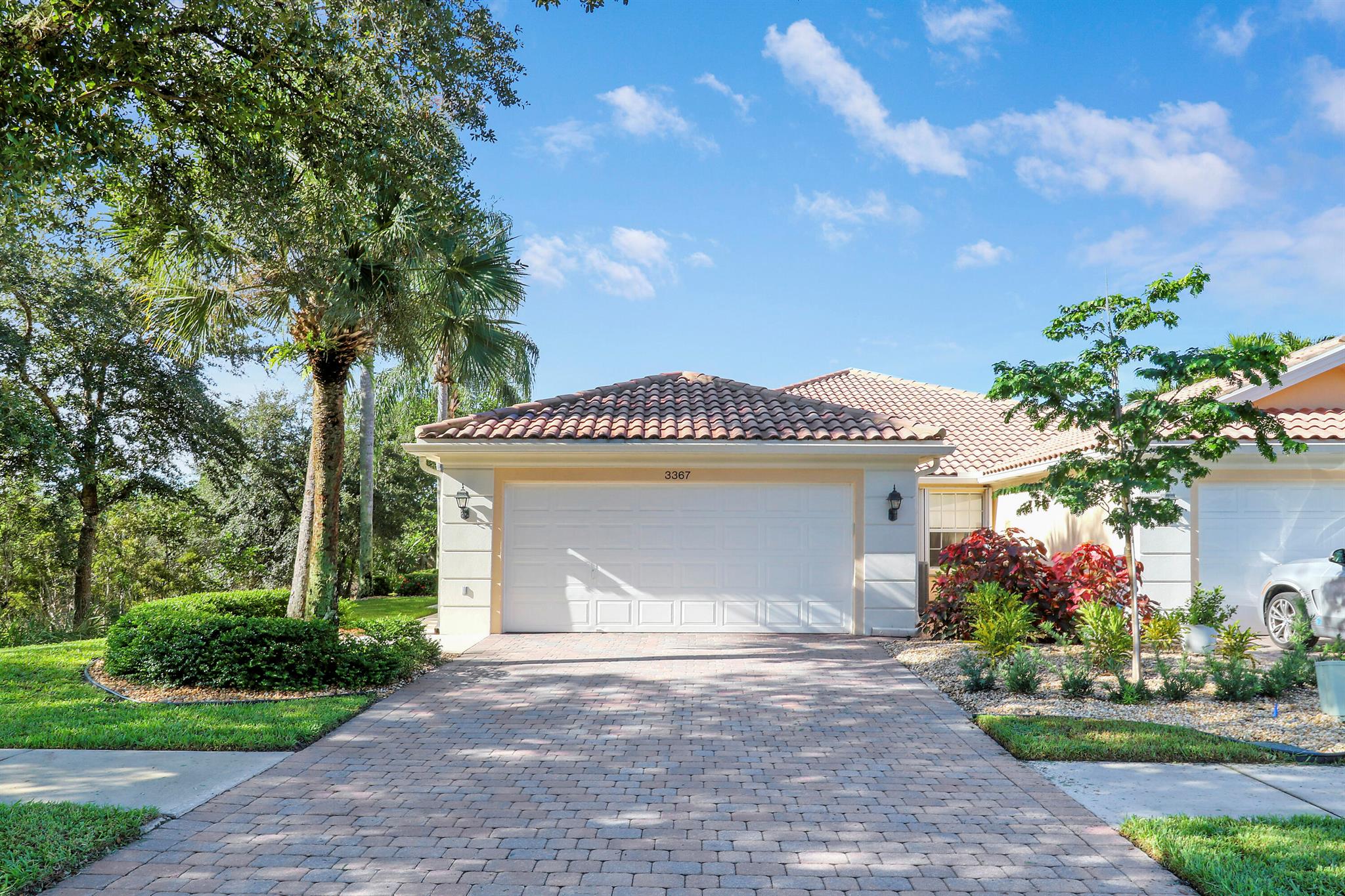 This Burg & DiVosta villa shows like a model. Gently lived in, this property is ready and waiting for new residents. Sitting on a unique interior corner lot location, this property features privacy galor with preserve on 2 sides of the home. White on white kitchen is light and bright. Full accordian shutters. A/C is 12/2016, water heater is 11/2017.