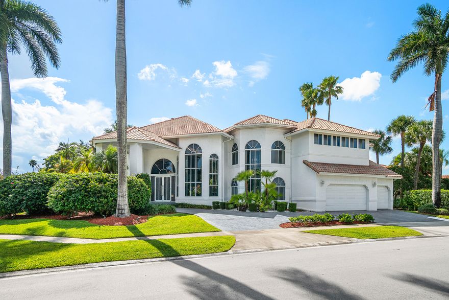 Magnificent home on a prime corner lot with circular driveway & grand portico entrance. This bright, spacious custom-designed home features 4 bedrooms & 3 baths + a powder room on the main level & upstairs primary suite - a true sanctuary with private balcony overlooking the screened pool & lanai, dual water closets, extra large closet, laundry & an additional room - ideal for an office, den, nursery, or exercise room. The updated kitchen opens to the breakfast nook & family room, creating a warm & inviting space for both entertaining & everyday living. Other highlights include an elevator, laundry room on each floor & 3-car garage. Boca Pointe is gated, beautifully maintained & located close to offices, shops, restaurants, recreation venues, great schools, houses of worship & the beach.