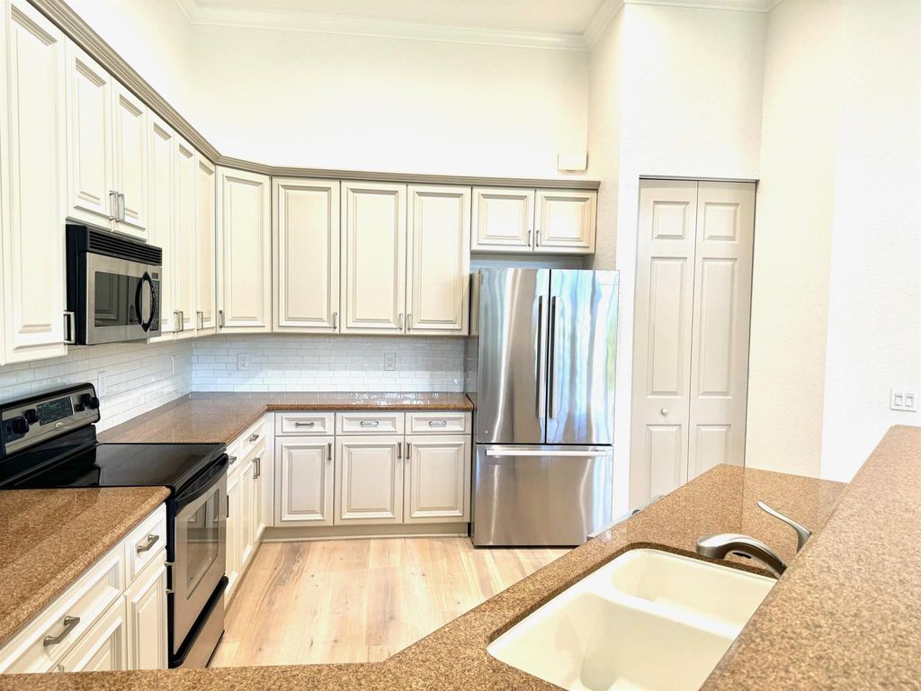 Photo of 129 Via Santa Cruz, Jupiter, FL 33458 (MLS # R10999709)