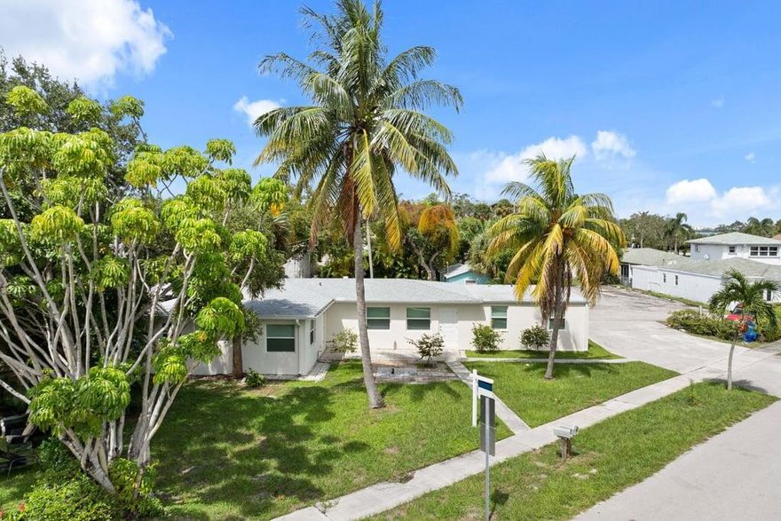 Live steps from the shimmering Intracoastal on Lake Dr in this brand-new, never-lived-in sunny 2BR/2BA home. Enjoy the luxury of fully renovated: appliances, quartz counters, full backsplash, updated lighting, impact windows, new blinds, and a brand-new washer/dryer. Walk-in closet and vinyl flooring. With ample parking included. Public boat ramp nearby. Walk or bike to the beach. Old Key Lime House, Dune Deck Cafe, Benny's on the Beach and the Eau Palm Beach Resort and Spa are just around the corner. Zoned for residential use with the flexibility to obtain a legal business license or tax ID for approved home-based operations, ideal for professionals seeking a stylish live-work lifestyle in Palm Beach. Live or work steps from the water.