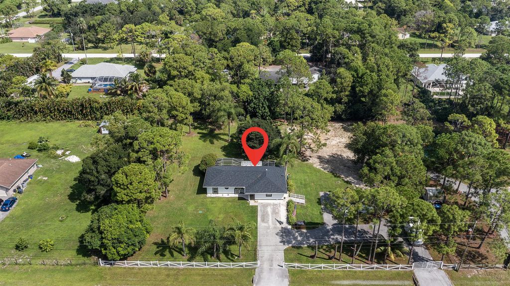 Photo of 18389 41st Road N, The Acreage, FL 33470 (MLS # R11147875)